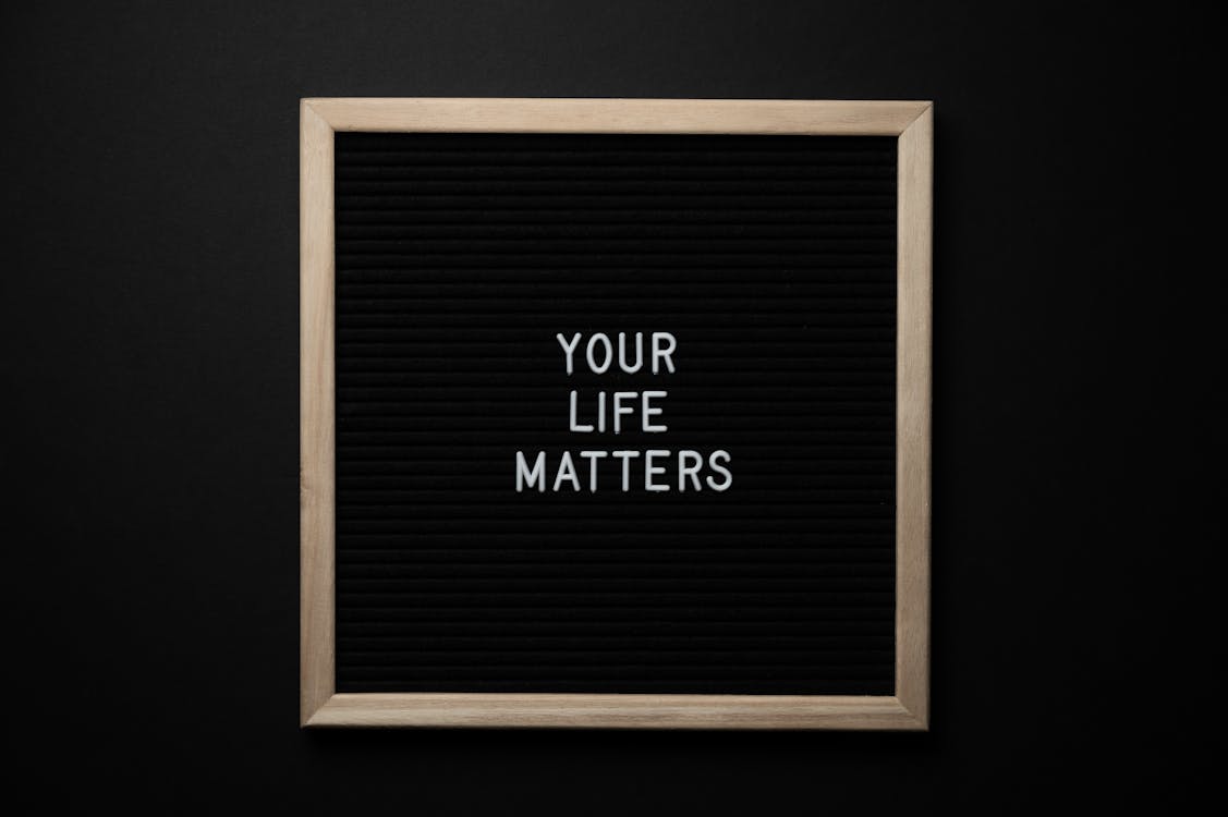 Free Blackboard with YOUR LIFE MATTERS inscription on black background Stock Photo