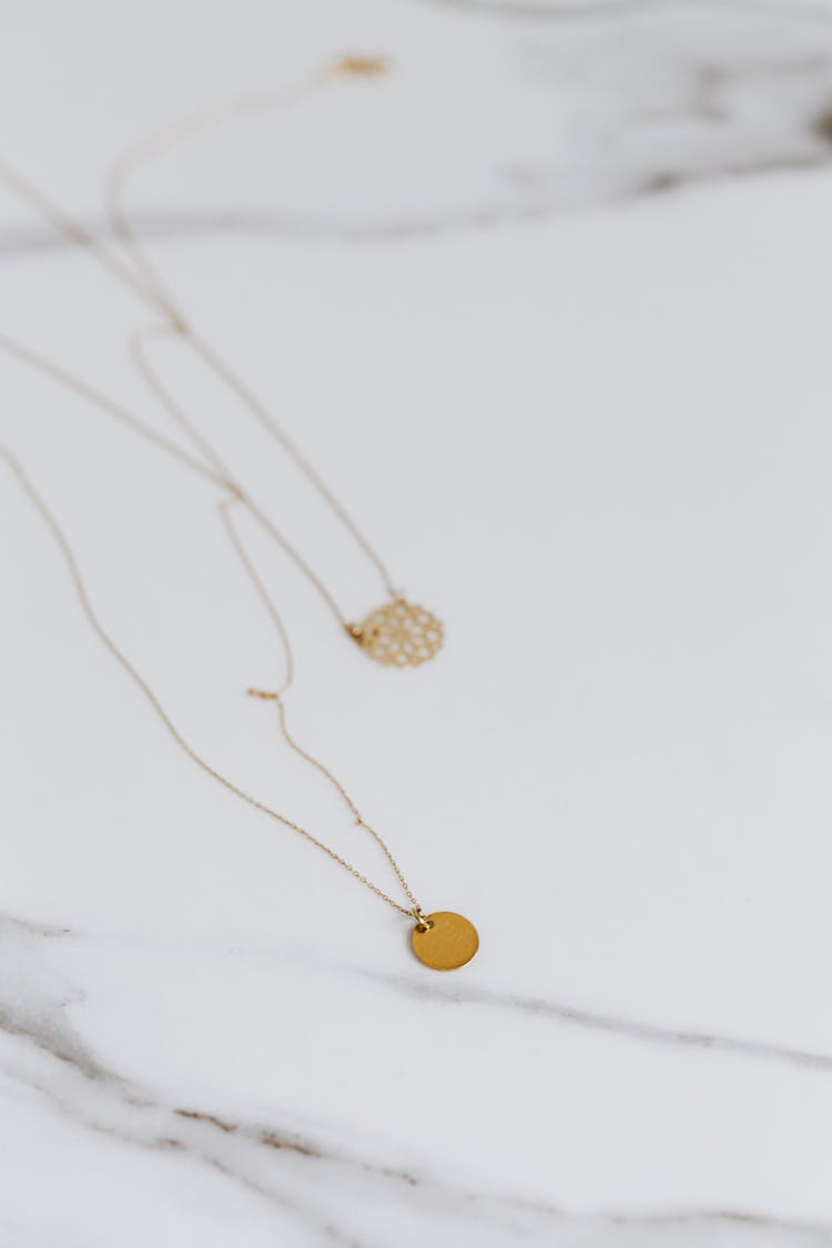 Gold Round Pendant On Necklace