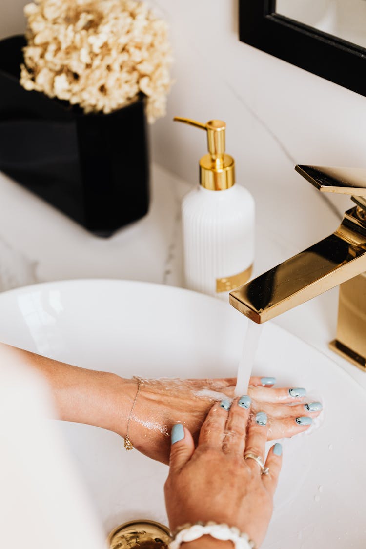 Woman Washing Hands With Soap 