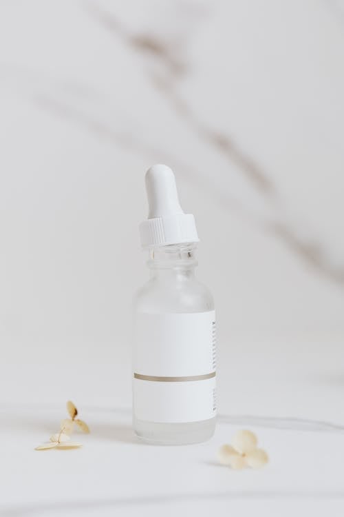 Free White Serum Bottle on White Surface  Stock Photo