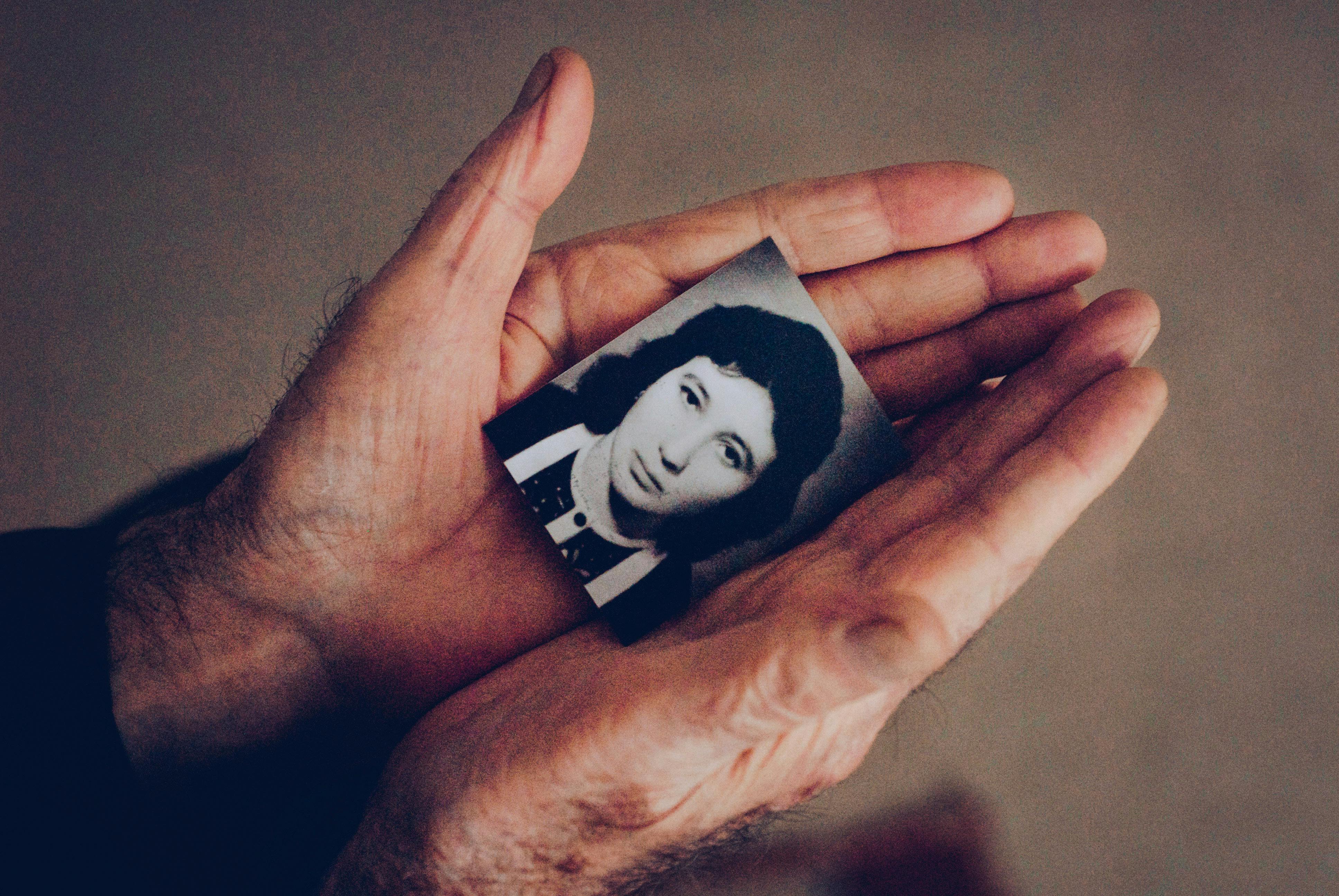 woman s photo on the person s palm