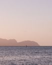 Paddler in Sea at Sunrise