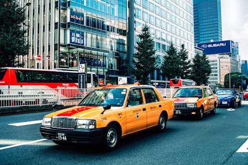 Yellow taxi car on street