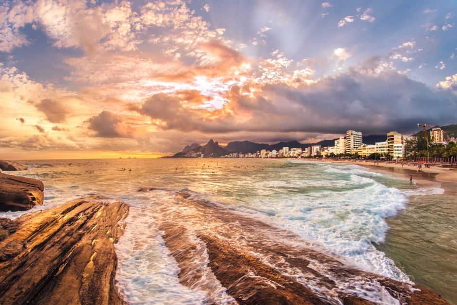 Lush green mountains and beaches under blue sky in Rio de Janeiro