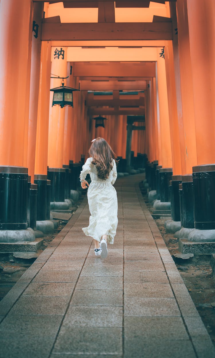 Woman In Dress Running