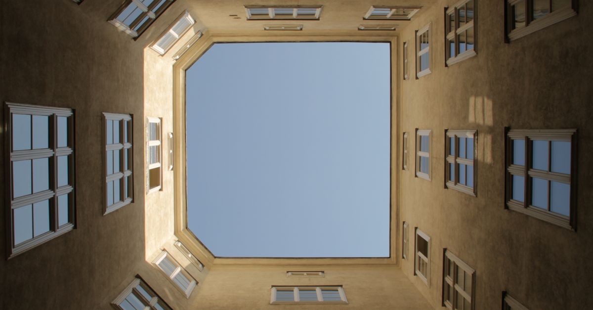 Clear Sky Seen from Below of Building ยท Free Stock Photo