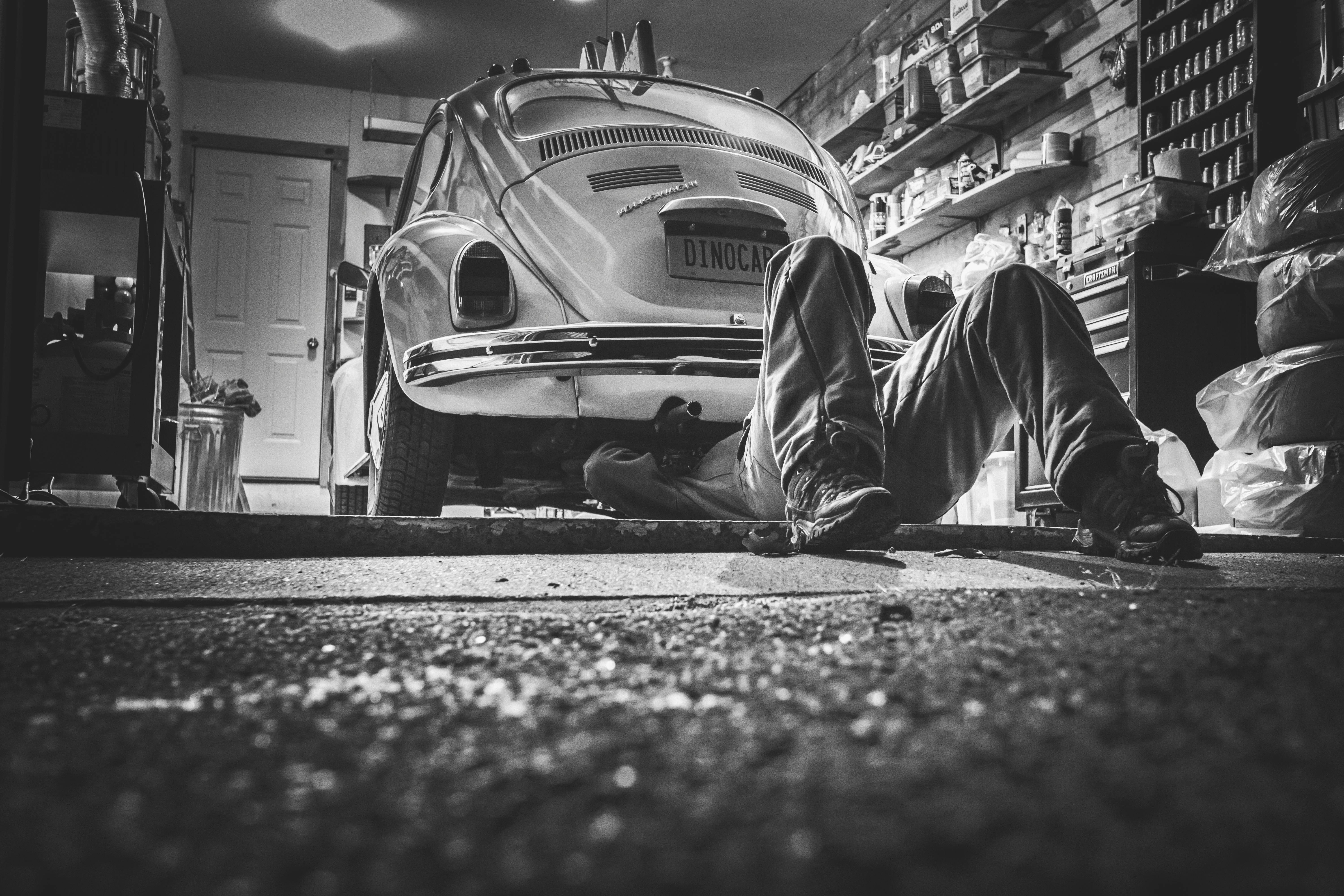 Person fixing car
