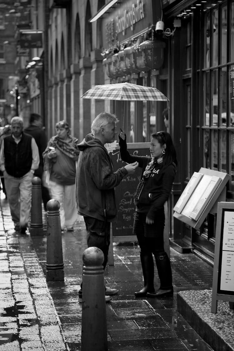 People In City During Rainfall