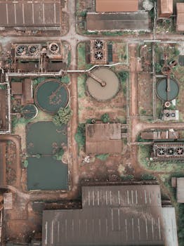 view of wastewater treatment plant with water basins