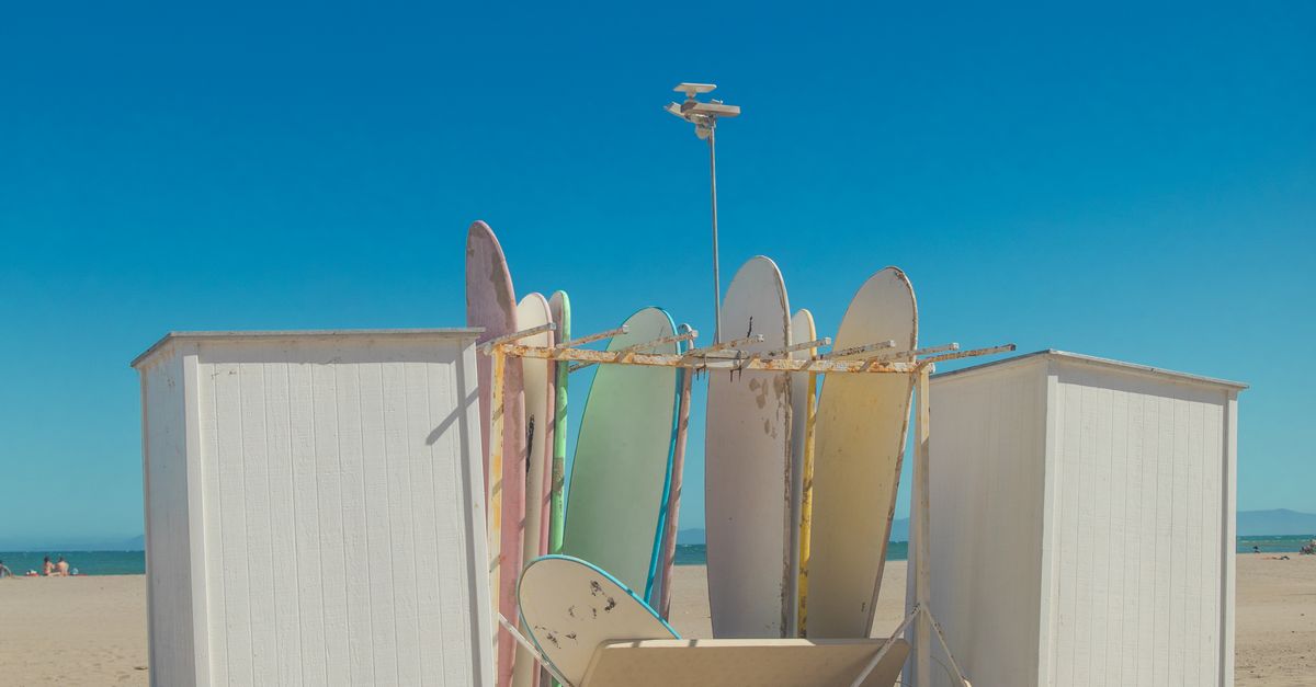 Mellow Racks Beach Surfboard Rack on Tropical Beach Resort · Free Stock Photo