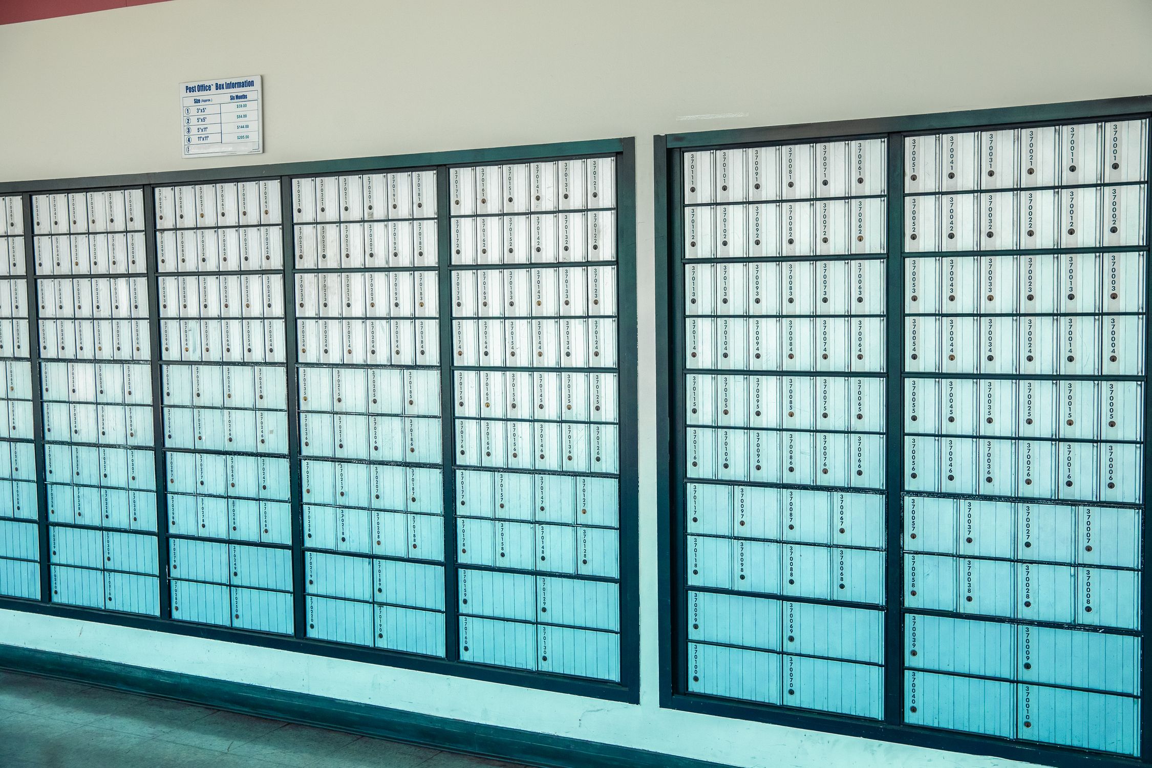 Mailbox In Mail Room Mailboxes in Post Office Wall · Free Stock Photo