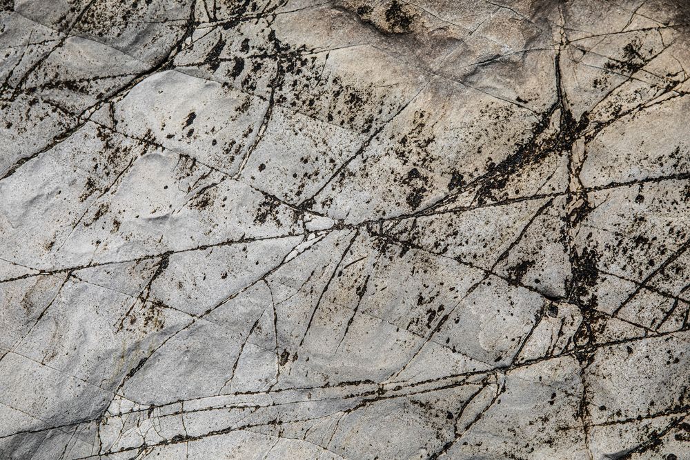 Weathered, dull marble surface before restoration