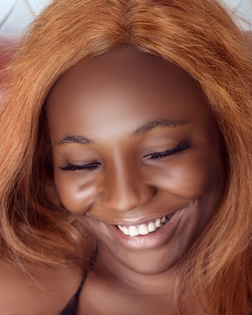 Free Close Up Shot of a Woman Smiling Stock Photo