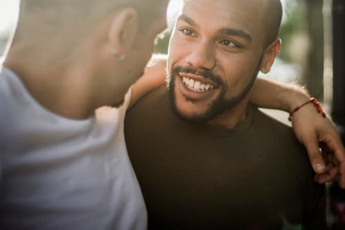 Free Two Men Looking at Each Other Stock Photo