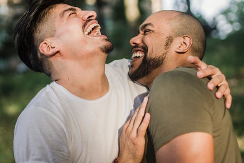 Close Up of Two Men Laughing