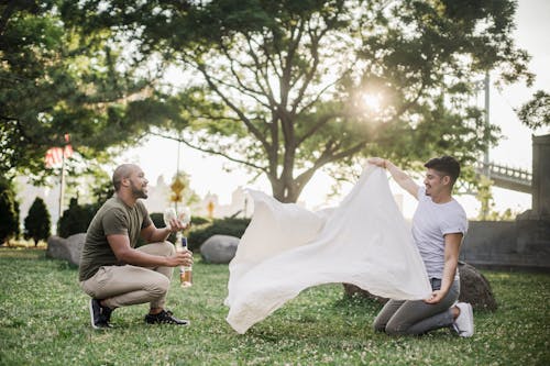 Free Two Men Having a Picnic Stock Photo