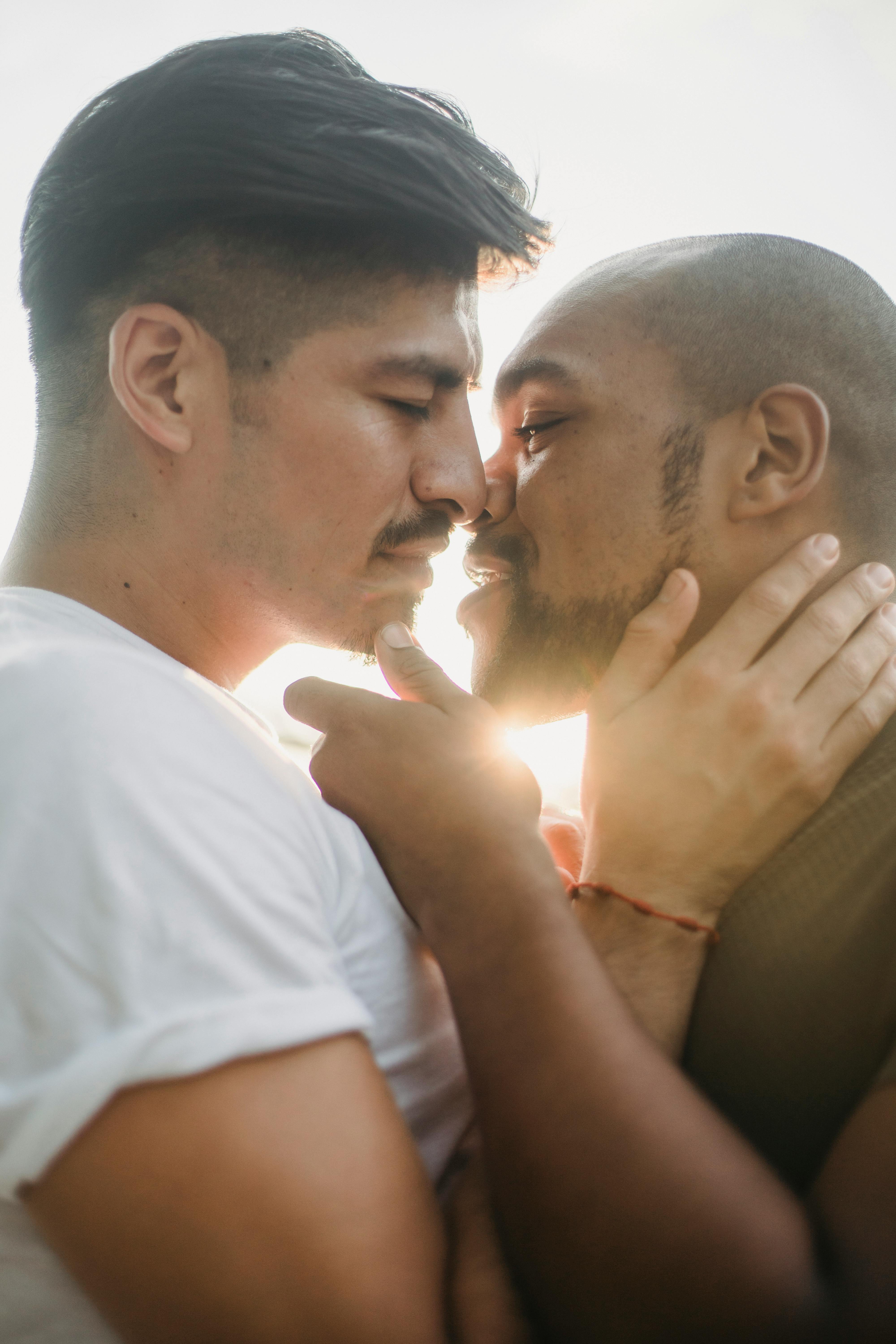 two men about to kiss