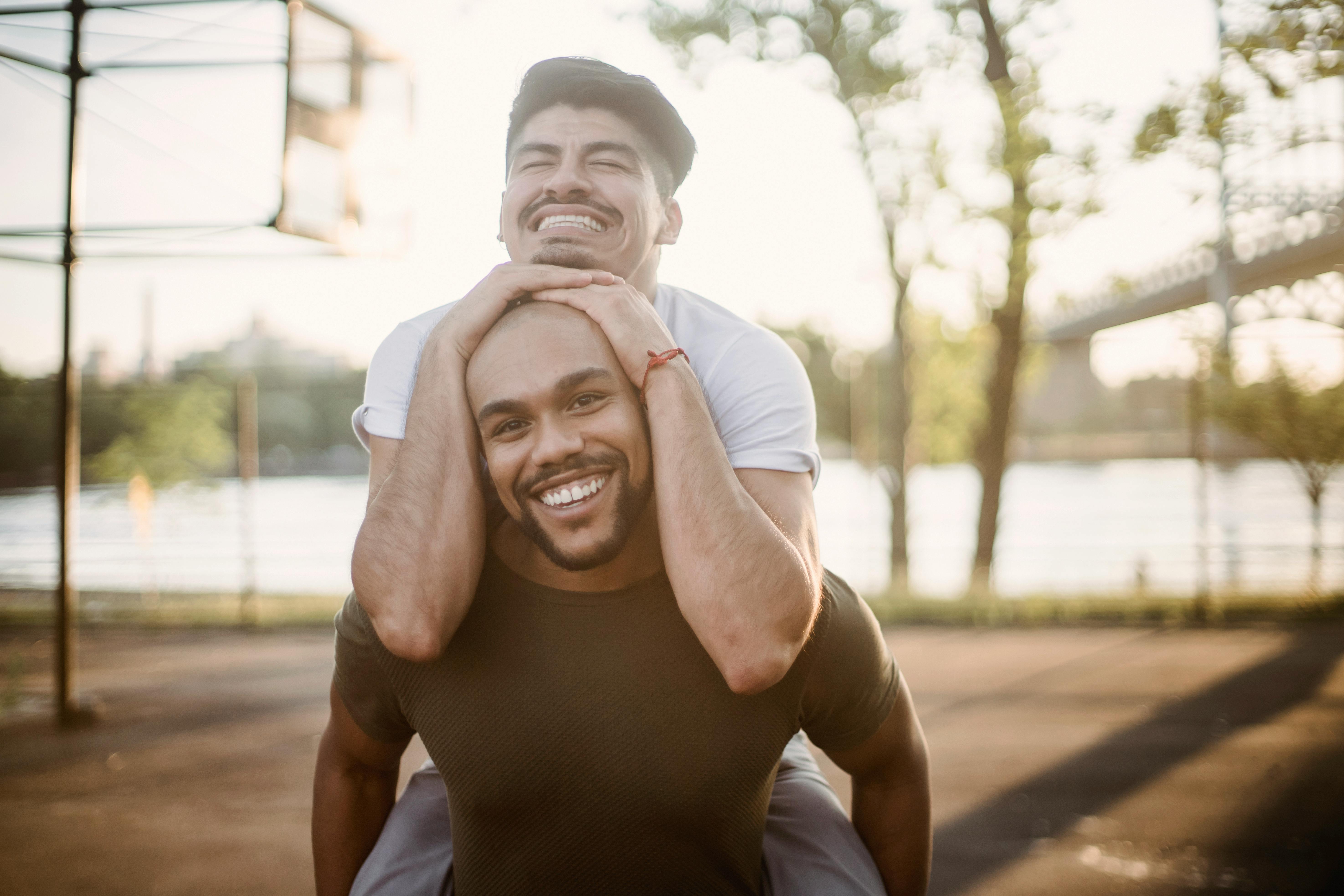 man carrying another man