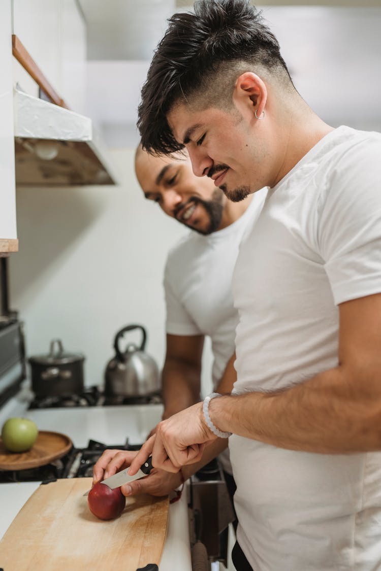 Couple Cutting Apple