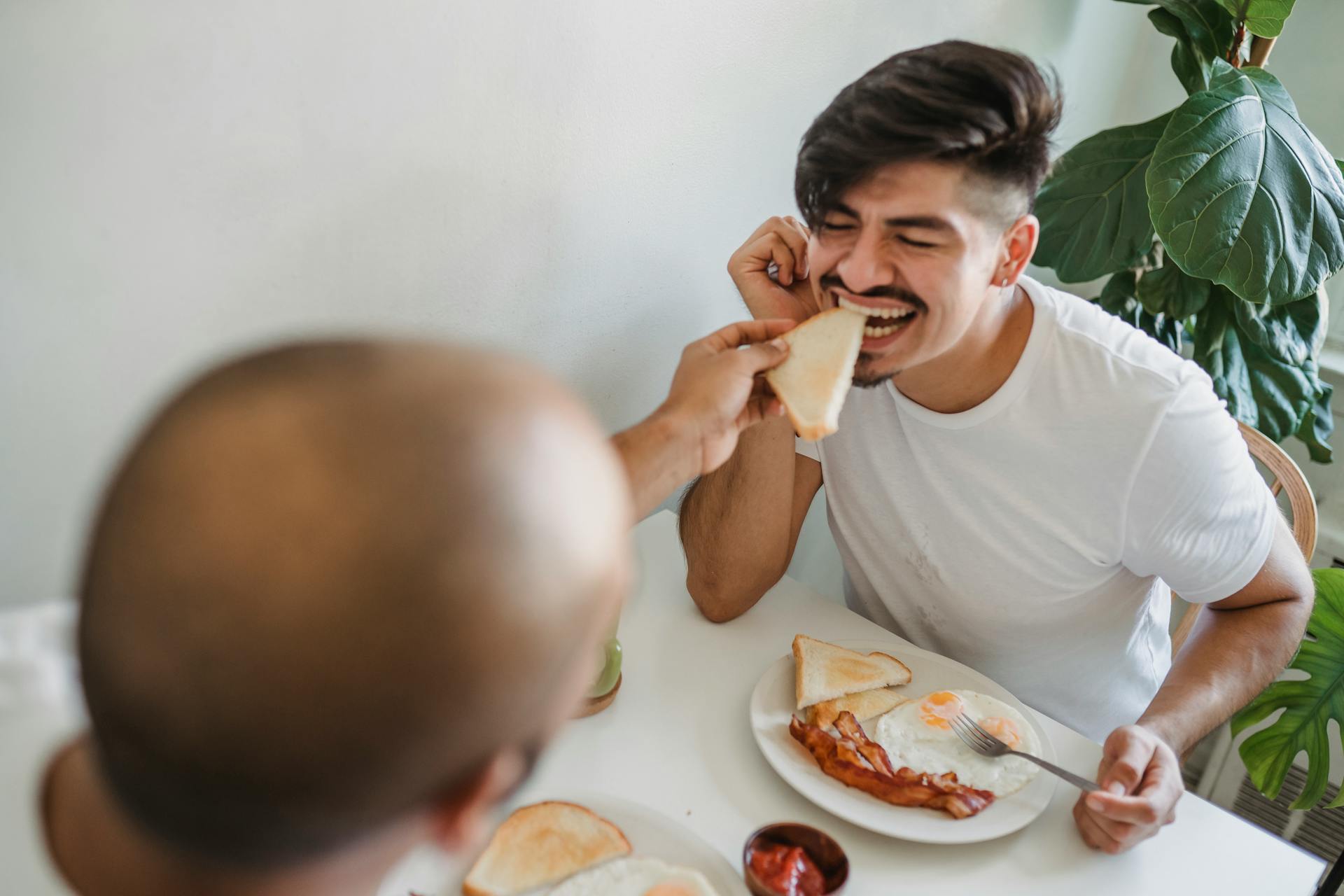 Men Eating Breakfast