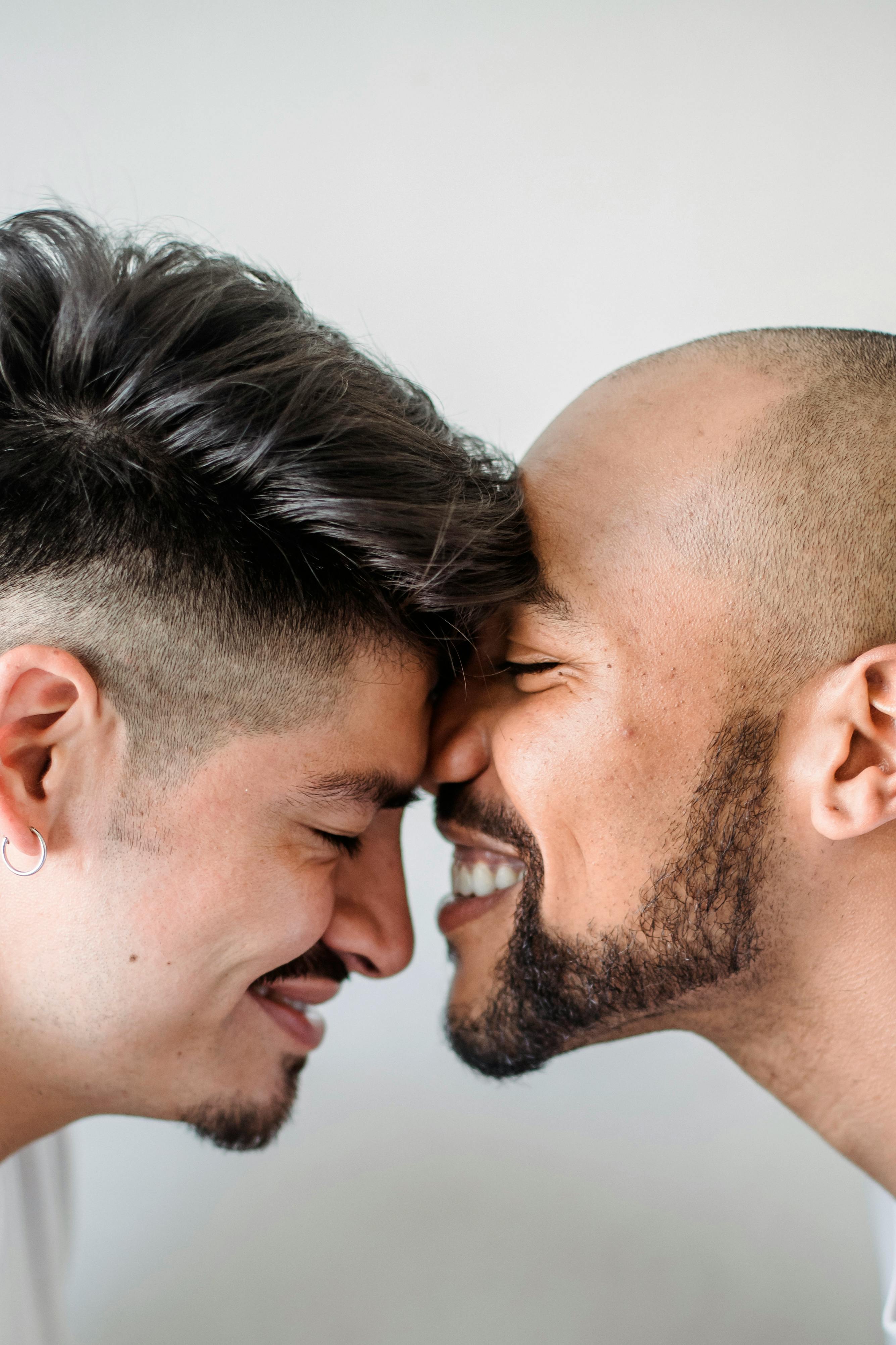 close up of two men being affectionate