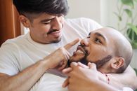 Portrait of Men Embracing Affectionately