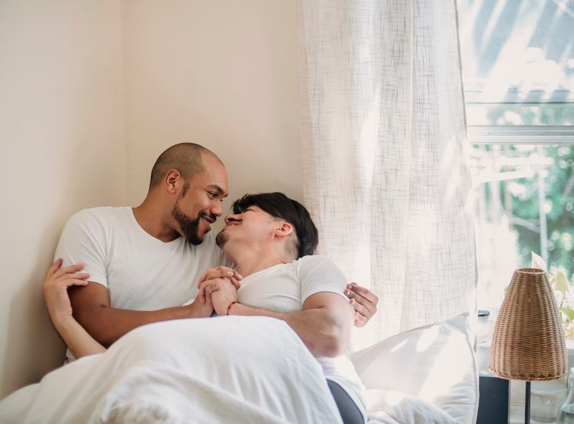couple video calling on laptop showing long distance relationship success