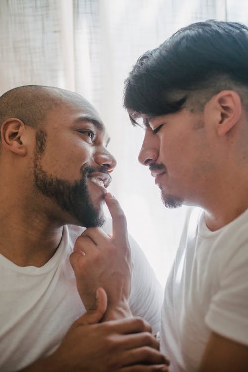 Couple Having an Intimate Moment and Looking at Each Other 