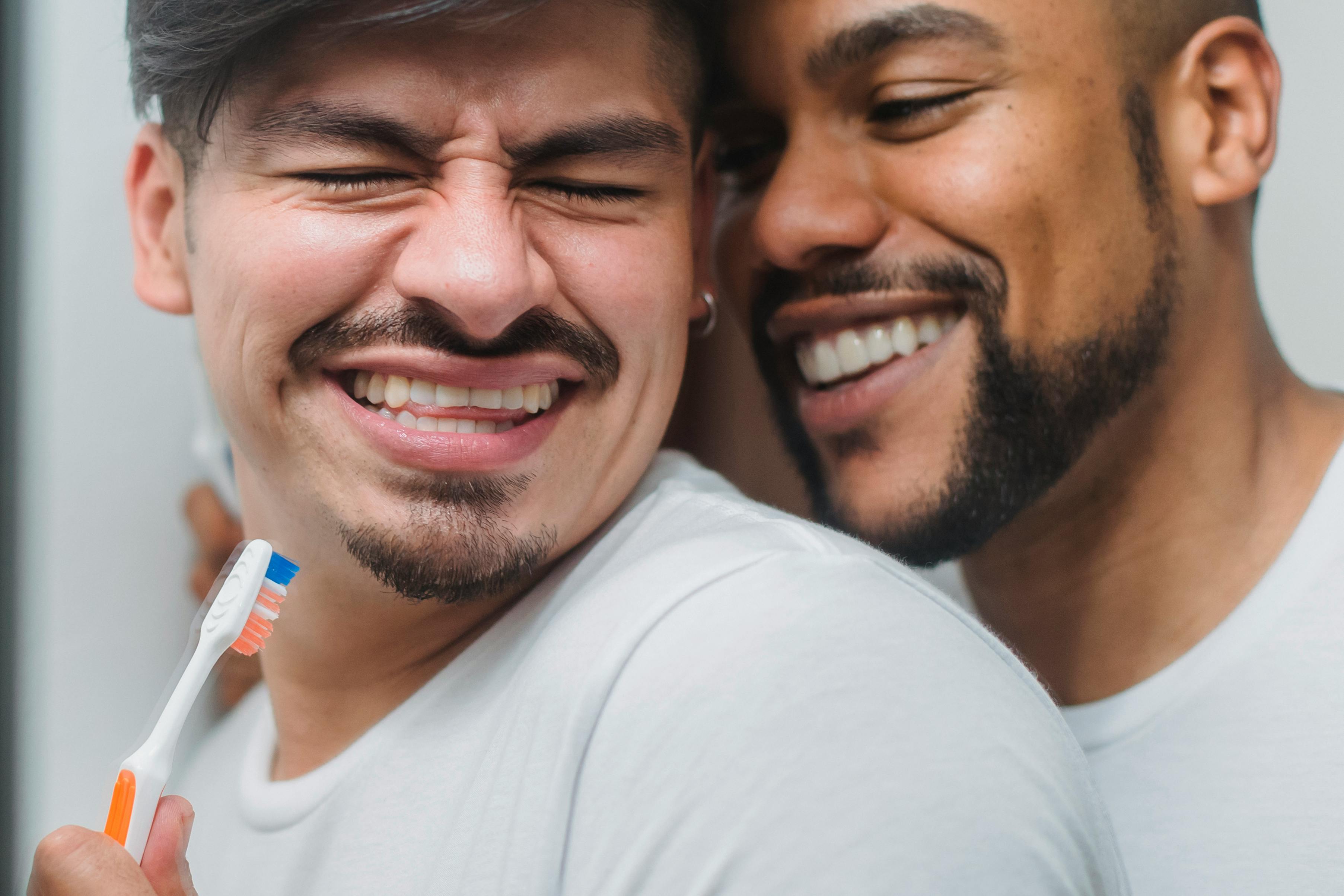 two men being affectionate