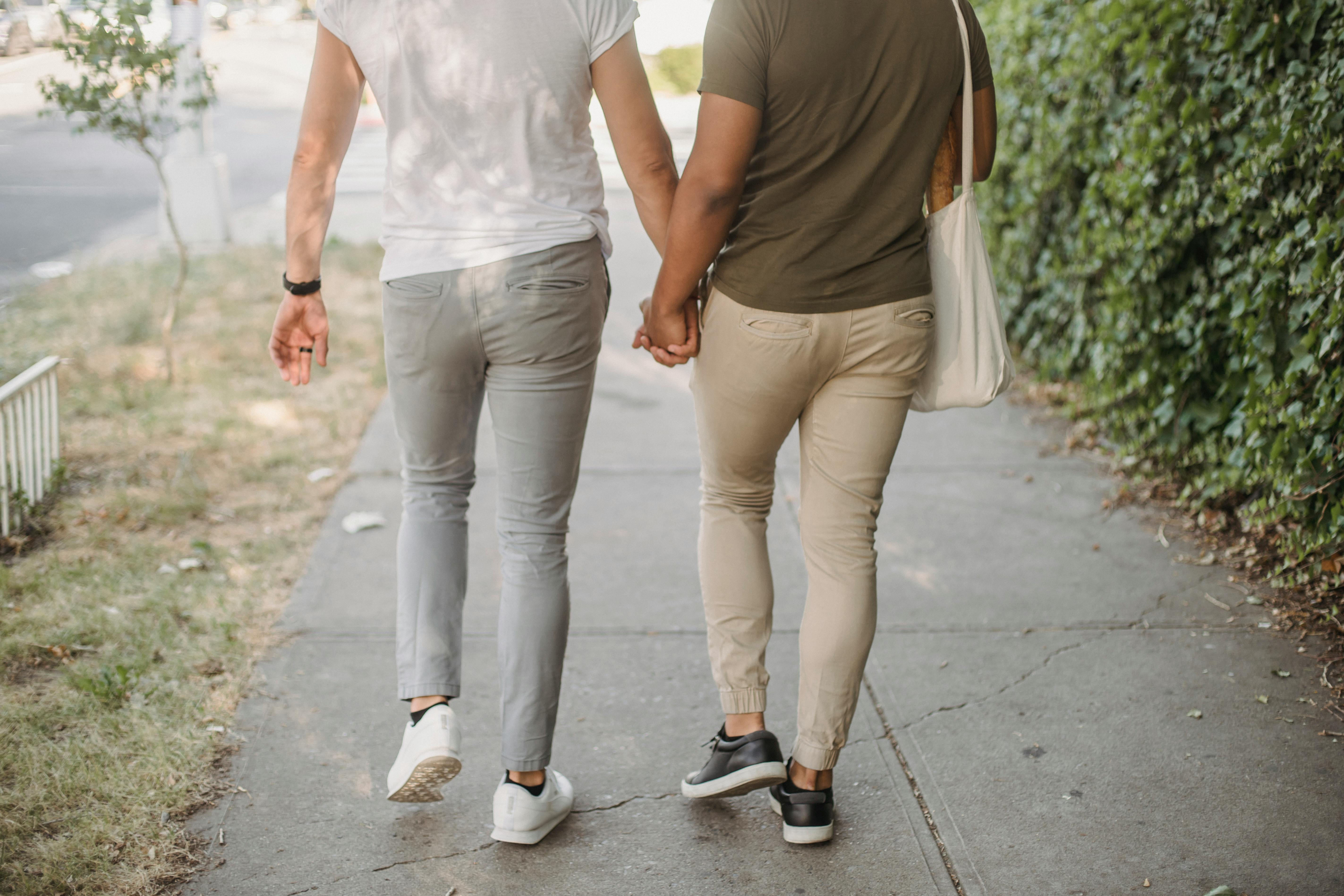 couple walking and holding hands