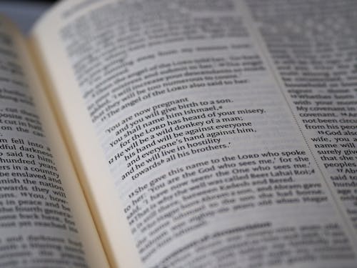 Close Up View Of Writings On A Page Of A Holy Book