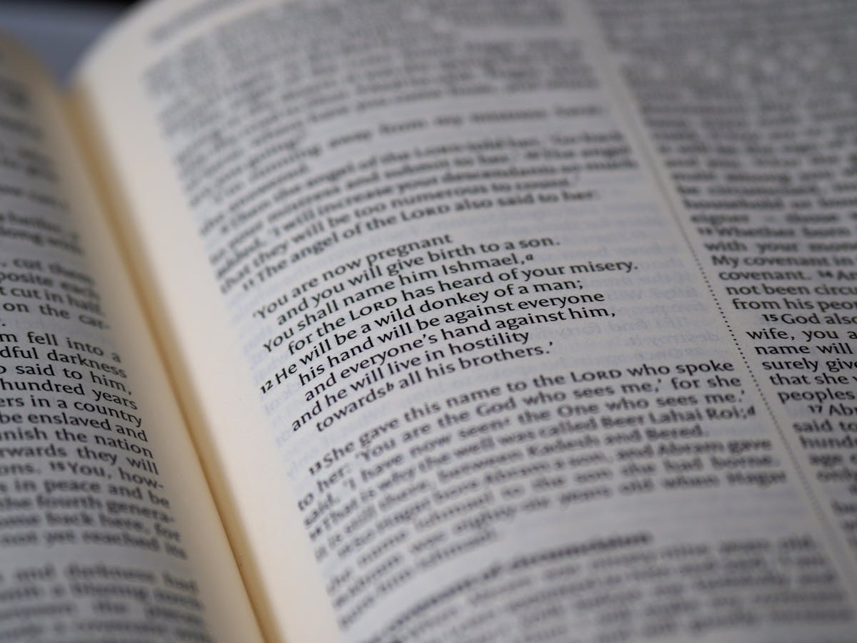 Close Up View Of Writings On A Page Of A Holy Book
