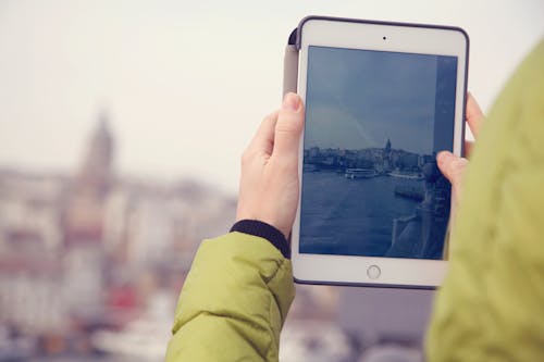 Person Taking a Picture Using an Ipad