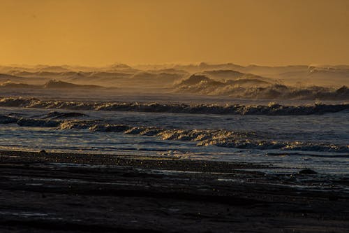 Waves Crashing During Sunset 