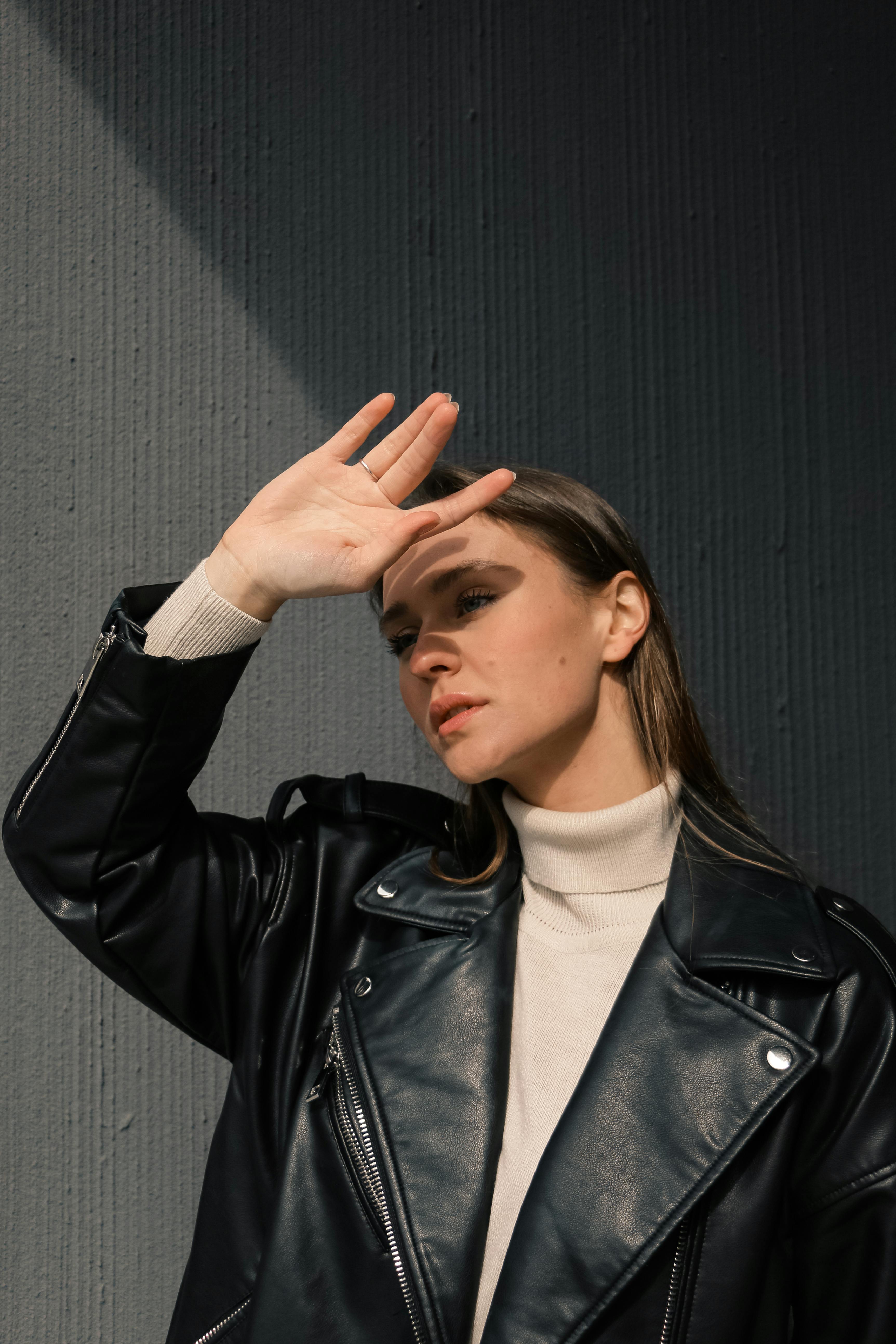 Woman in Beige Turtleneck and Black Leather Jacket · Free Stock Photo