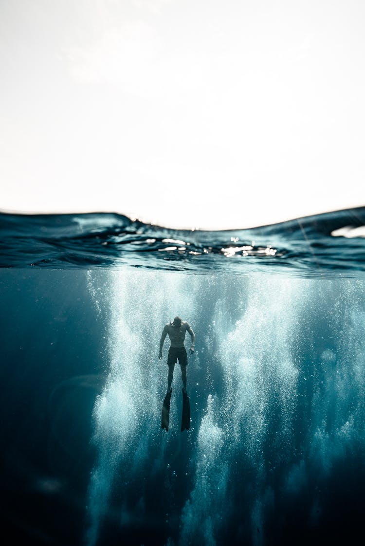 Photo Of Person Underwater