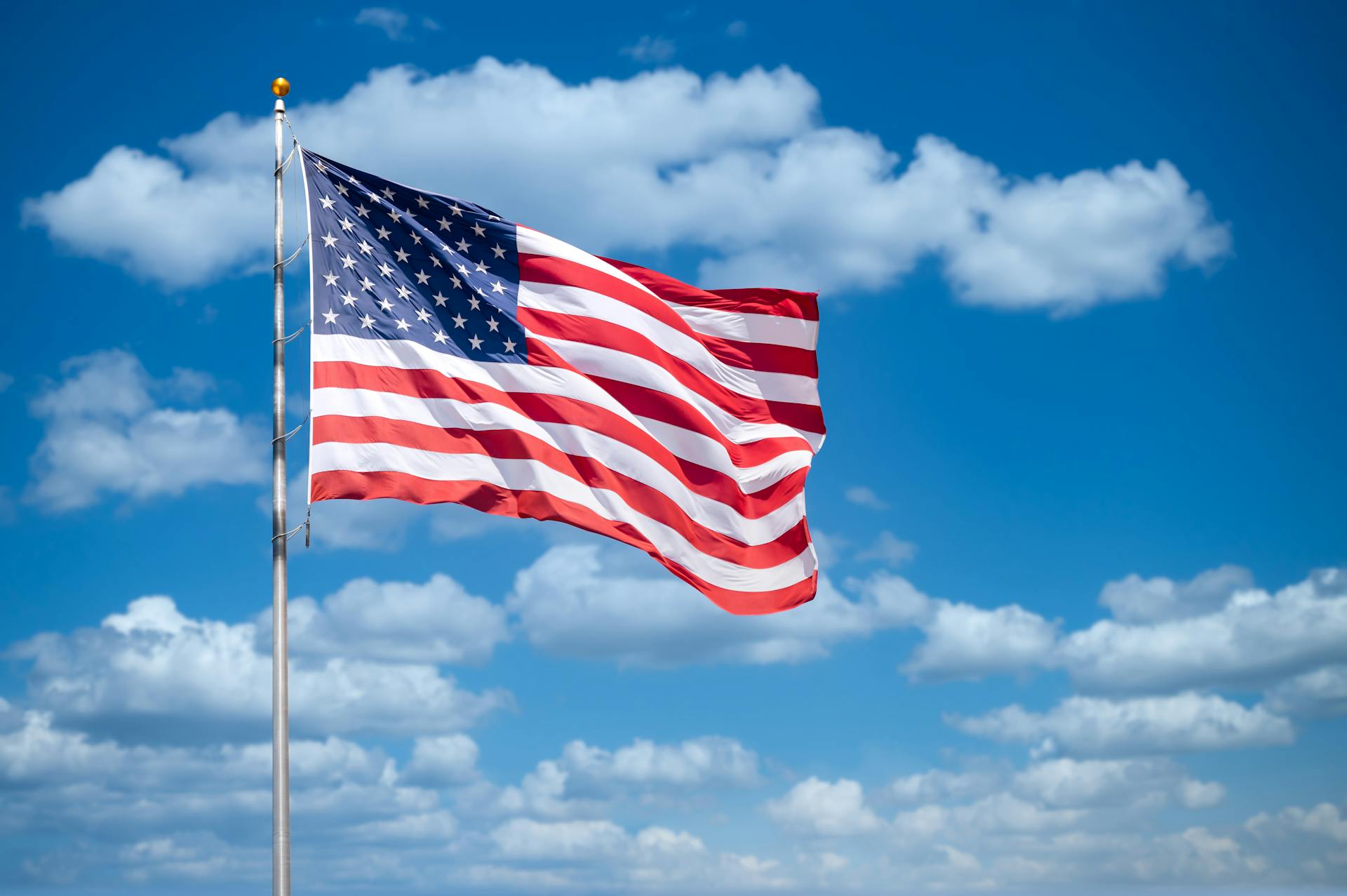 USA flag on blue sky