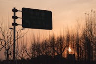 Information Sign at Sunset