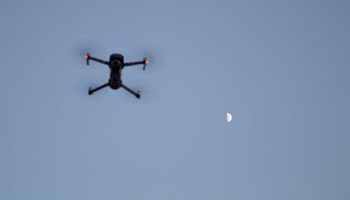 Free stock photo of drone, evening, focused moon