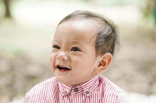 Free Close-Up Shot of a Baby Boy Smiling Stock Photo