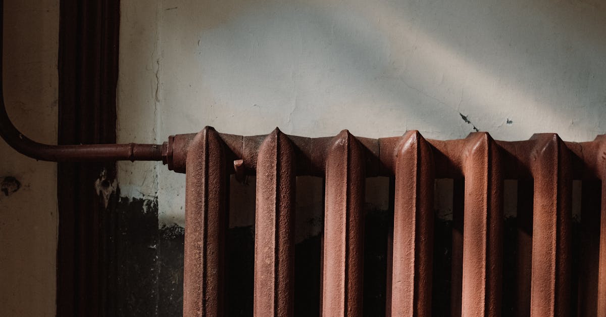 Rusty Steam Radiator on Wall · Free Stock Photo