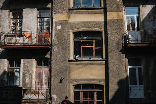 Brown Wooden Window on Brown Brick Building · Free Stock Photo