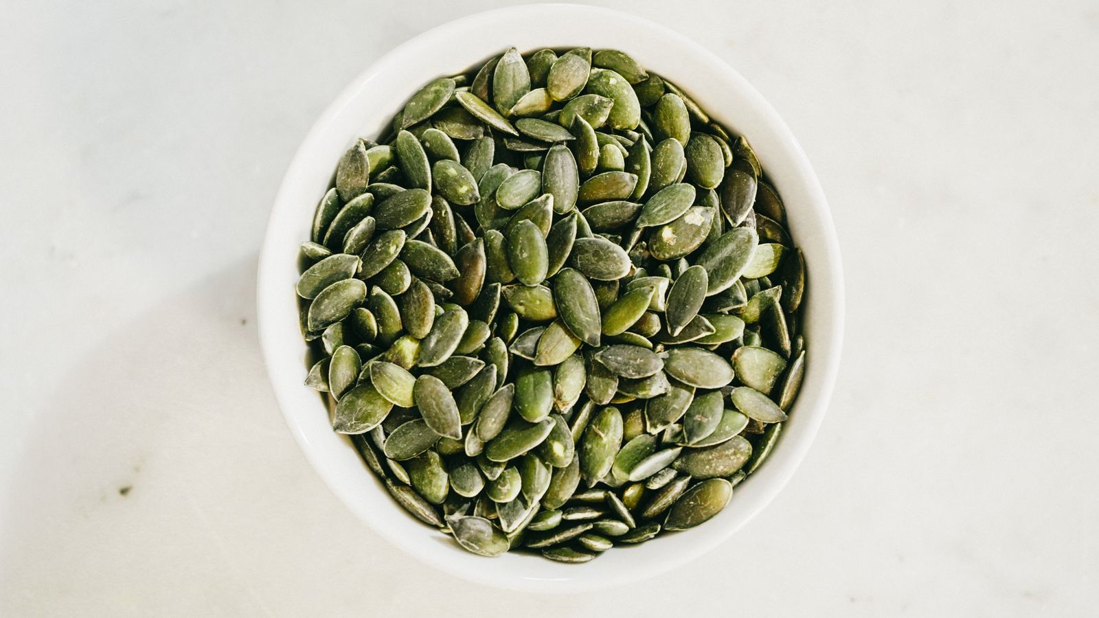 A bowl of green pumpkin seeds — photo by Antoni Shkraba on Pexels A bowl of green pumpkin seeds