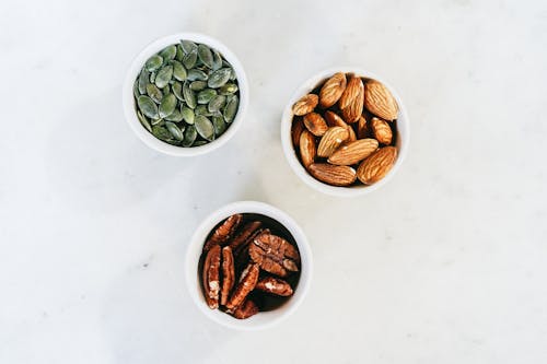 Бесплатное стоковое фото с вид сверху, гайки, грецкие орехи