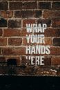 Brown Brick Wall With White and Black Quote