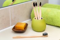 Green Apple Fruit Beside Brown Wooden Fork and Knife