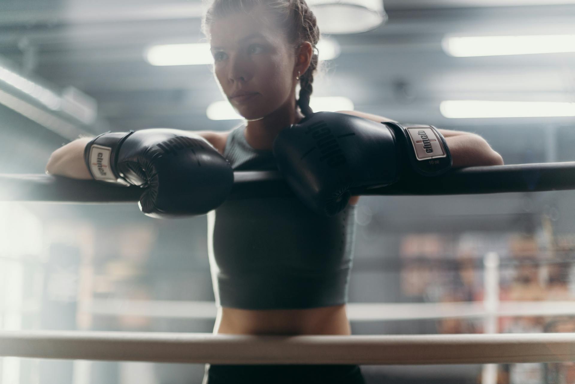 Woman in Black Boxing Gloves