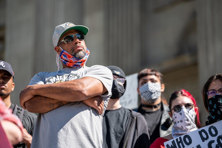 Black Man In Medical Mask Protesting On Street