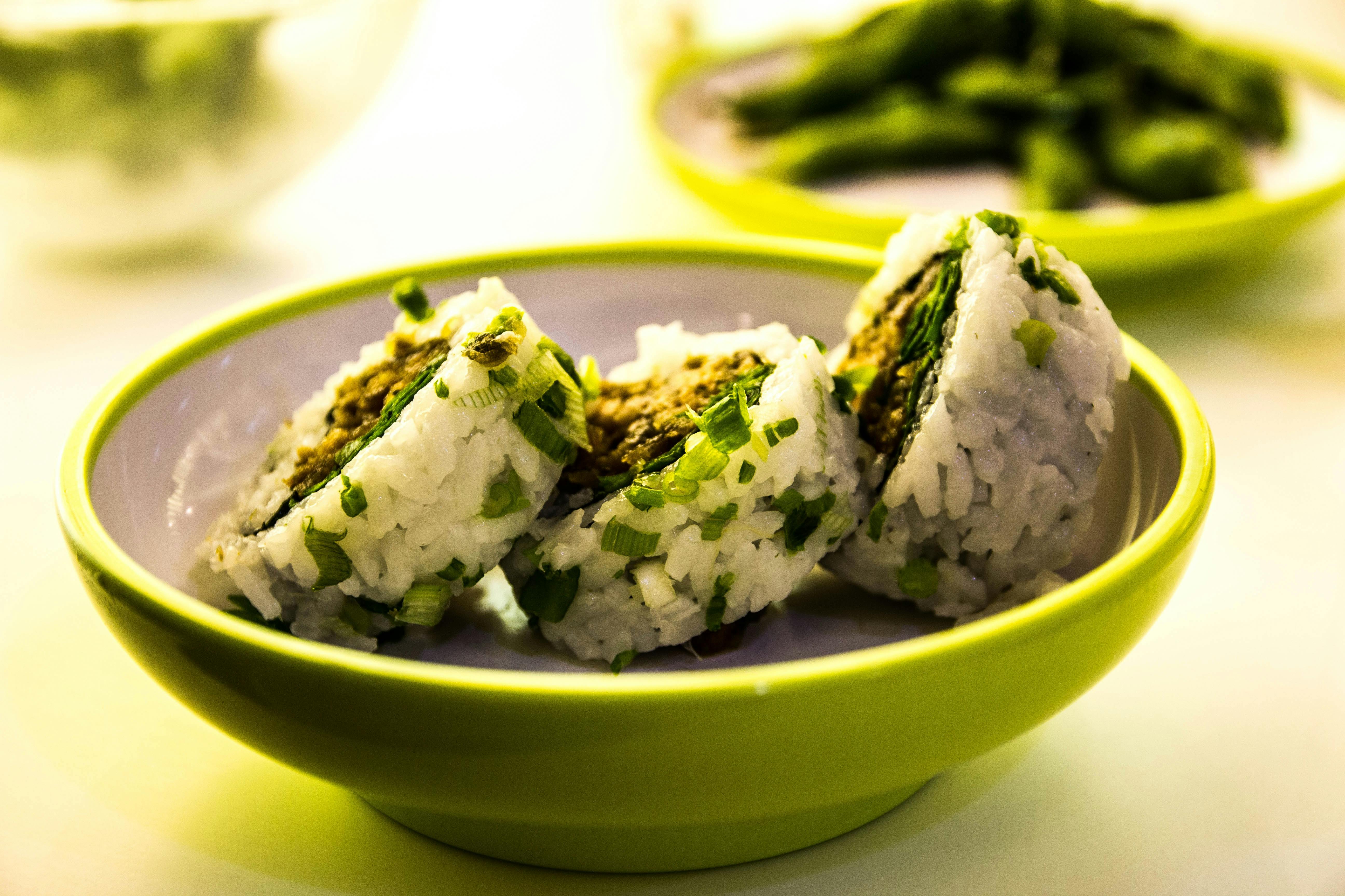 white rice on green round bowl