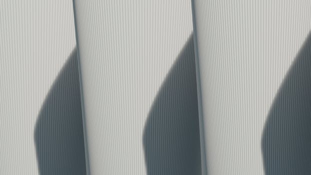 Abstract architectural image showcasing minimalist lines and strong shadows.